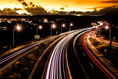 Light trails on road at night