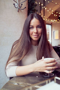 Portrait of a smiling young woman