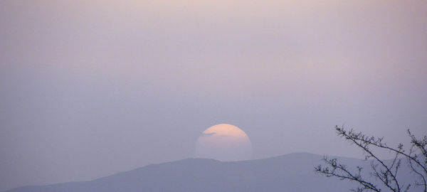 Low angle view of mountain against clear sky