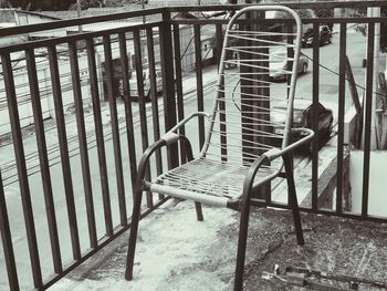 Chairs and table on railing