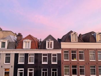 Buildings in city against sky