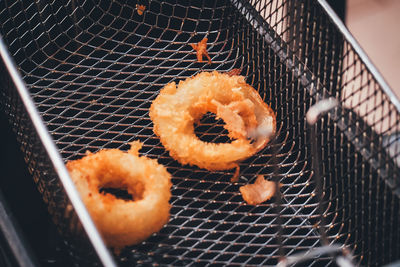 High angle view of food on metal grate