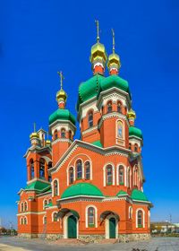 Low angle view of building against blue sky