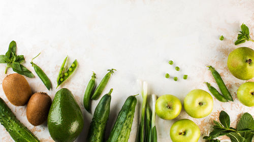 High angle view of fruits against white background