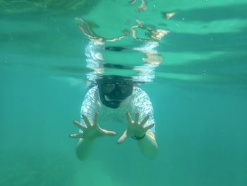 Person snorkweling in the sea