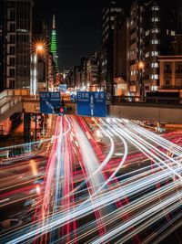 Light trails on city street at night