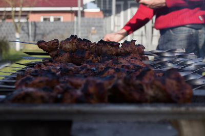 Close-up of meat on barbecue grill