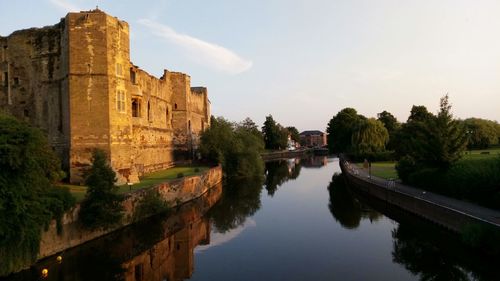 Panoramic view of lake and building against sky