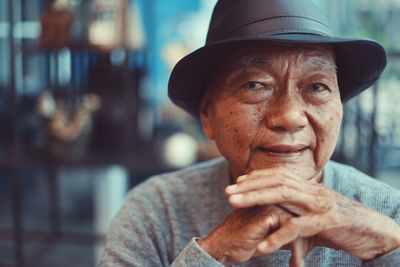 Portrait of man wearing hat