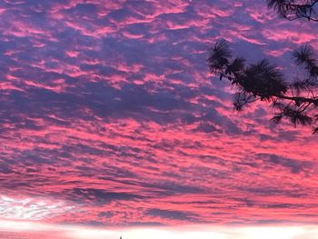 Low angle view of dramatic sky during sunset