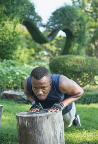 Portrait of young man on field