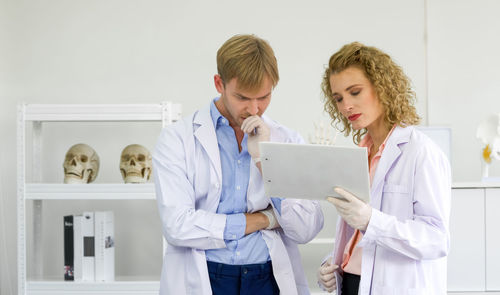 Young couple looking at camera