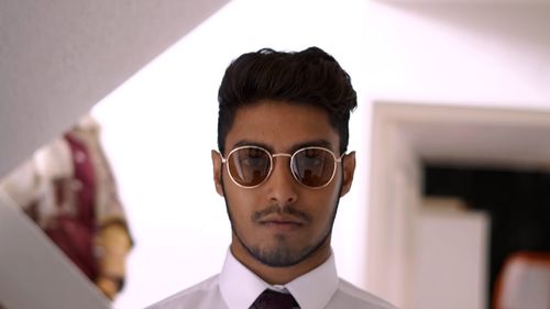 Portrait of young man wearing sunglasses