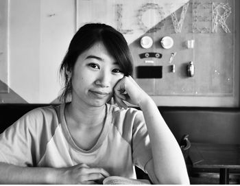 Portrait of girl sitting at home