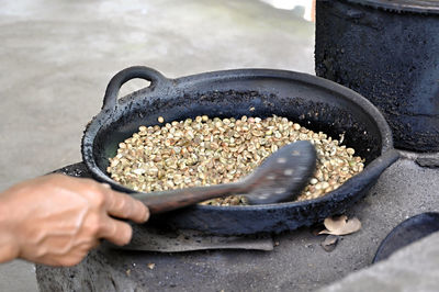 Close-up of man preparing food