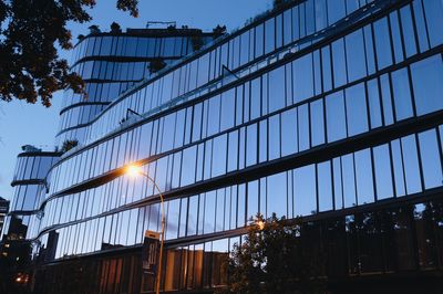 Low angle view of building against sky at dusk