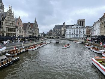 Canal passing through city buildings