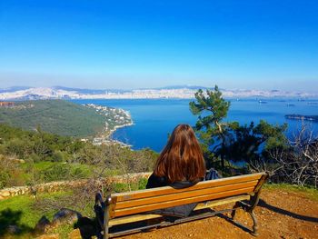 Scenic view of sea against clear blue sky