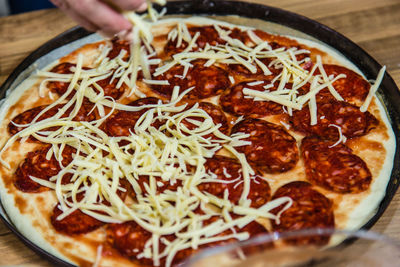 Close-up of pizza served on table