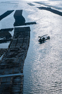 High angle view of ship sailing on sea