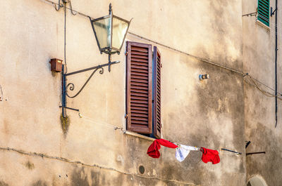 Siena province - details of old building architecture in asciano town