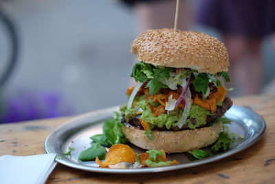 Close-up of burger in plate on table