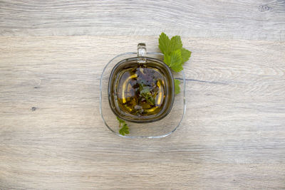 High angle view of vegetables in jar on table