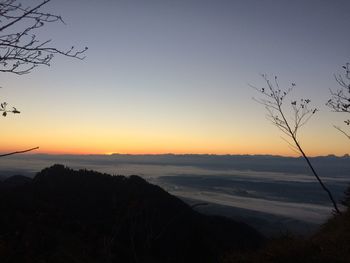 Scenic view of silhouette landscape against sky during sunset