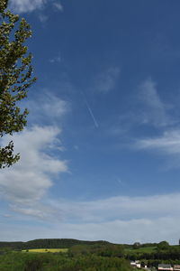 Low angle view of vapor trail in sky