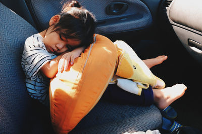 Girl sleeping in car