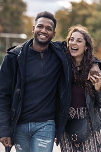 Portrait of smiling young couple