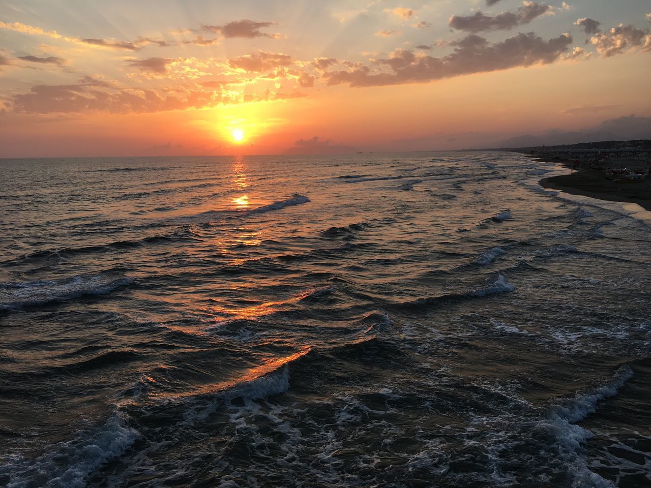 sunset, sea, beauty in nature, nature, scenics, sky, sun, water, tranquil scene, tranquility, orange color, outdoors, idyllic, cloud - sky, no people, beach, wave, horizon over water