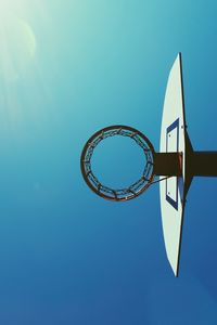 Basketball hoop and blue sky in the street