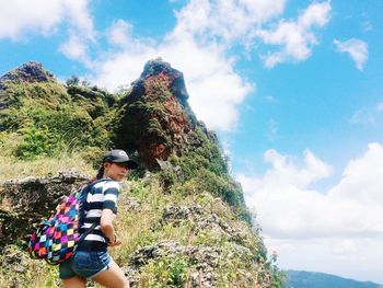 Young woman standing on mountain