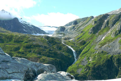 Landscape view alaska glacier river flowing down through mountain