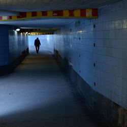 Full length of woman walking on walkway