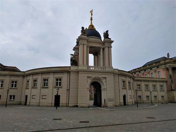 Low angle view of historic building against sky