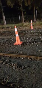 High angle view of arrow symbol on railroad track