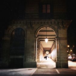 People walking in tunnel