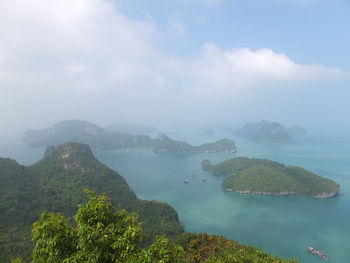 Scenic view of sea against cloudy sky