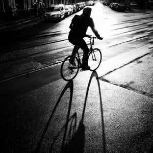 Blurred motion of people walking on road