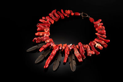 High angle view of christmas decorations against black background