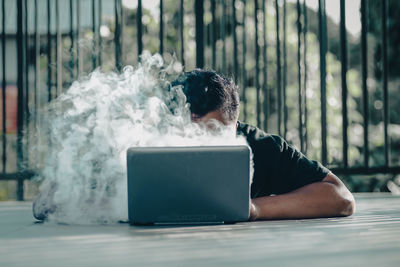 Woman using laptop at home