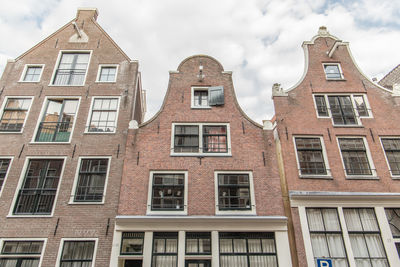 Low angle view of buildings against sky