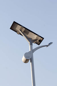 Close up solar powered street light on highway