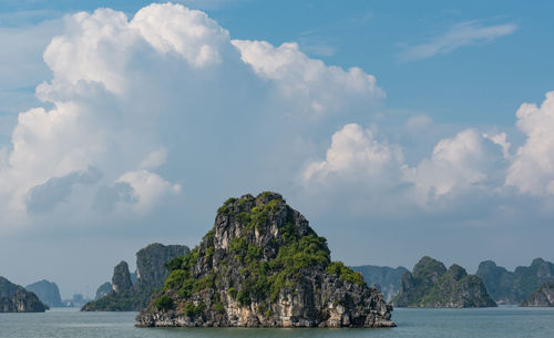 Scenic view of sea and rocks against sky