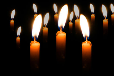 Close-up of burning candles