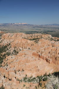 Scenic view of rocky mountains against clear sky