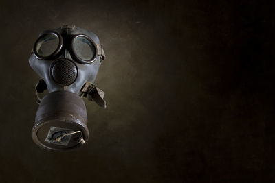 High angle view of gas mask on table