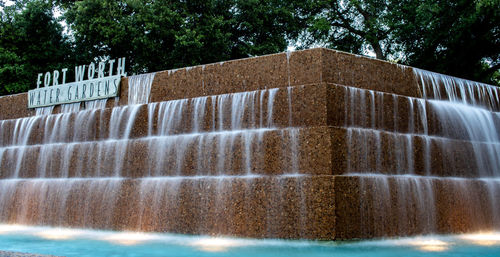 Fountain against built structure